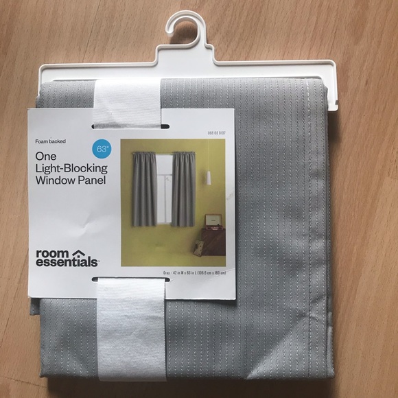 One gray light-blocking window panel